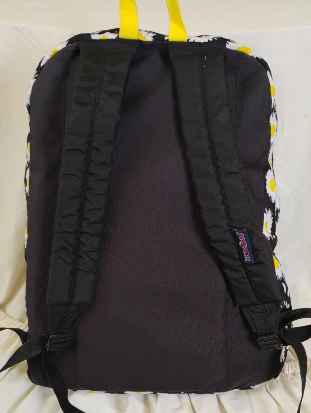Jansport Black Daisy Backpack with Yellow Accents